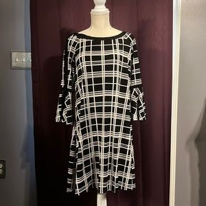 Black and white dress with bell shaped sleeves, size 12